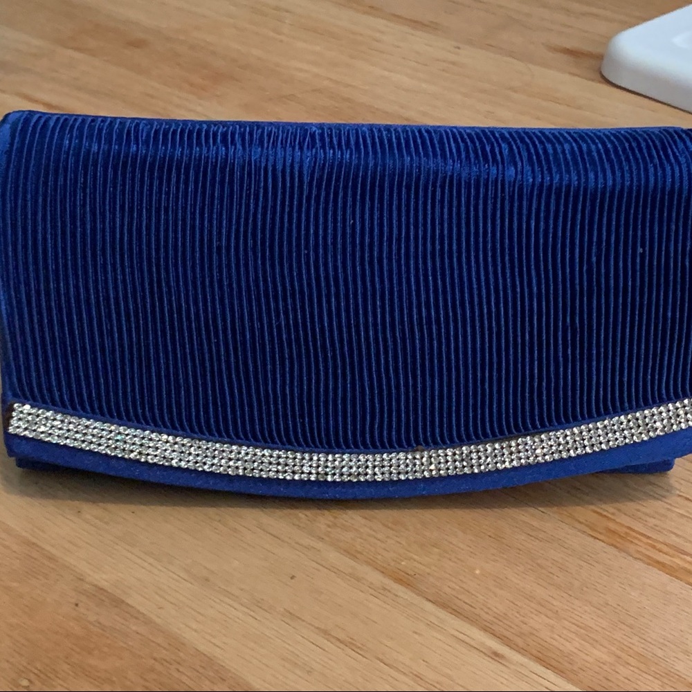 Blue studded clutch shoulder bag